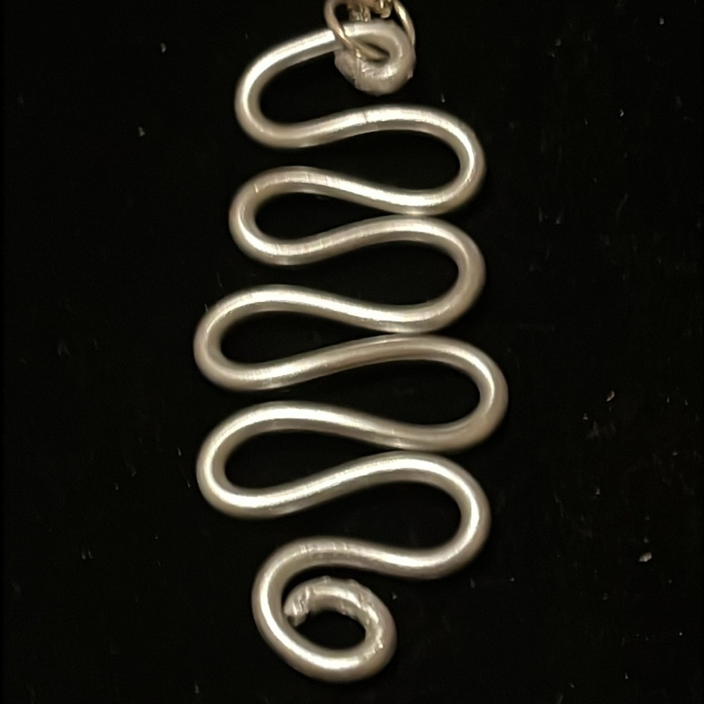 Elegant Silver Wave Hand Design Necklace - Picture 10 of 17